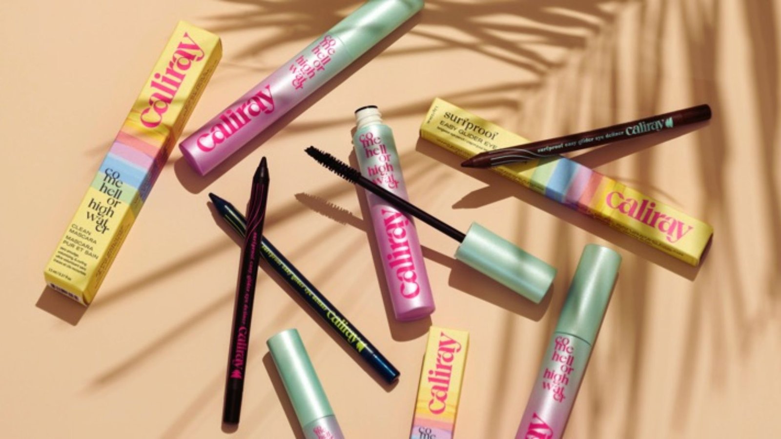 A collection of mascara tubes labeled for different skin types, showcasing options for various preferences and needs.