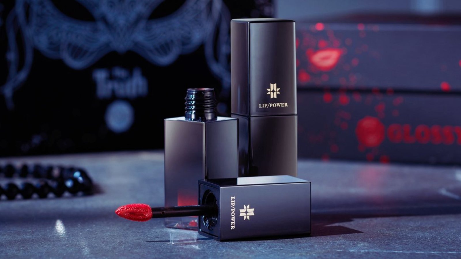 Several vampire lipsticks arranged on a table, showcasing their unique packaging.
