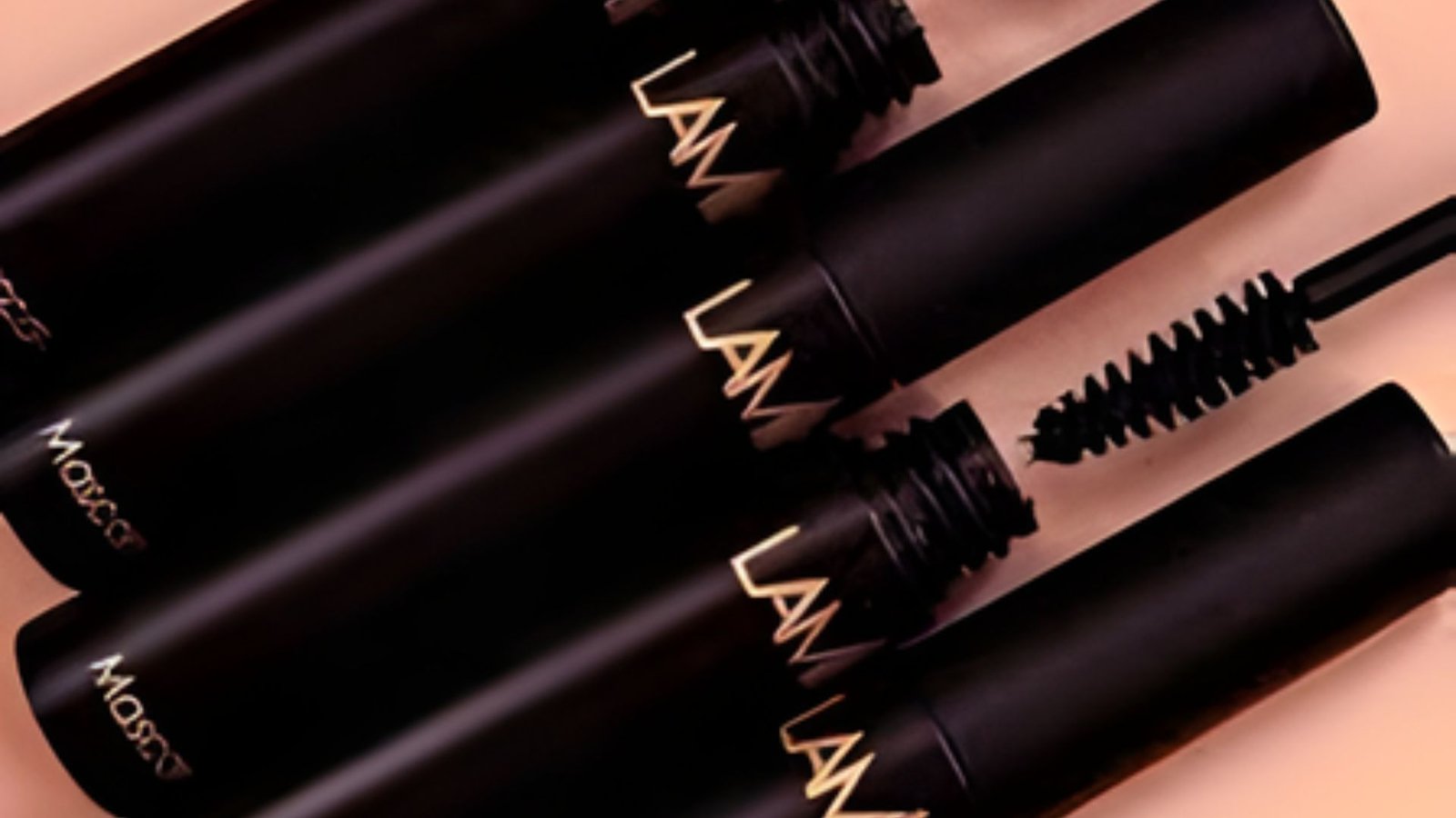 L'Oreal NYX mascara tube with a sleek design, showcasing its branding and product details against a neutral background.
