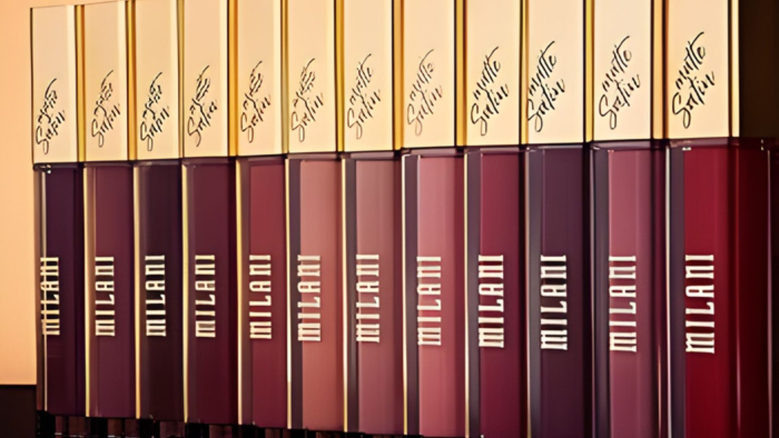 A row of milk lipsticks displayed neatly, showcasing various shades and packaging designs.