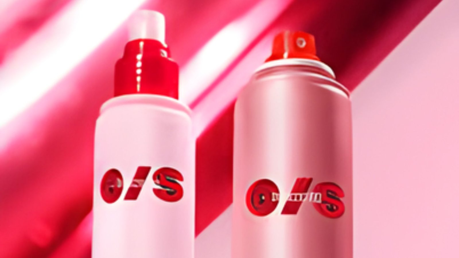  Two bottles of hair spray positioned against a vibrant red background.