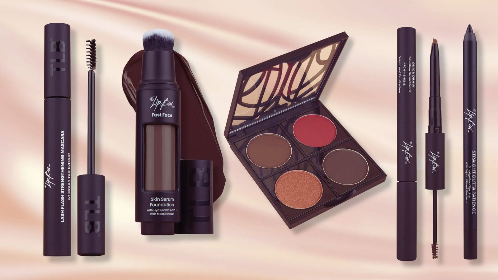 A collection of makeup products suitable for diverse skin tones displayed on a neutral background.