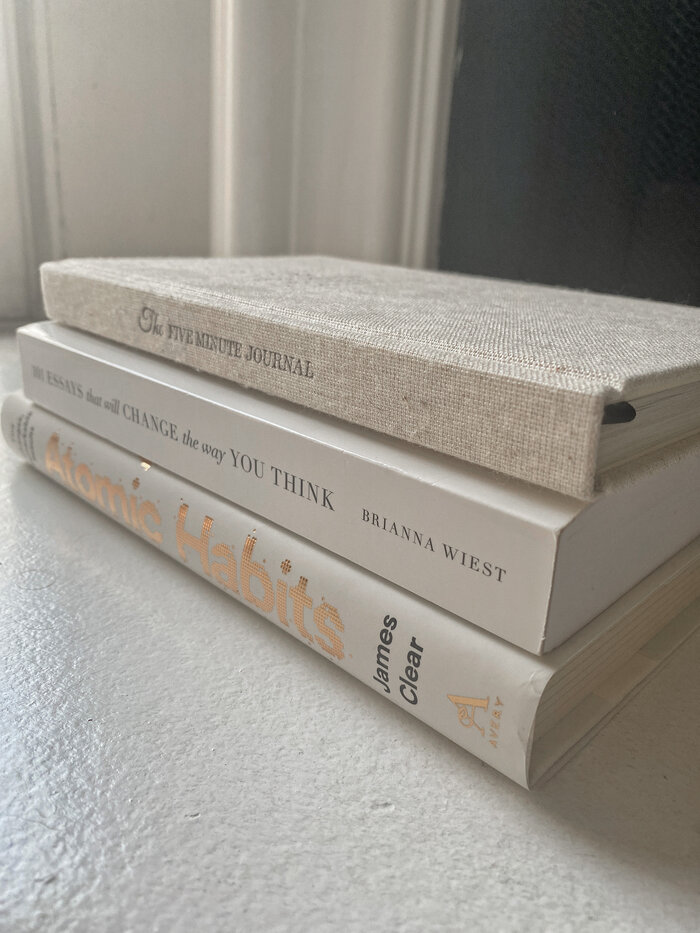 stack of journals and books