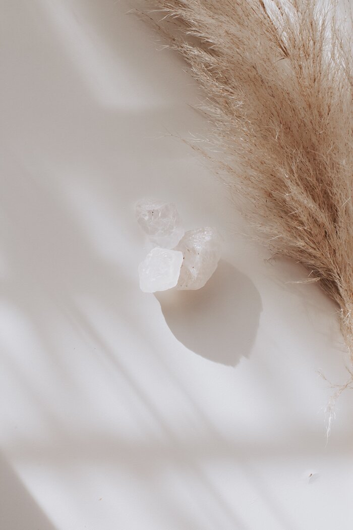 pampas grass and calcite crystal