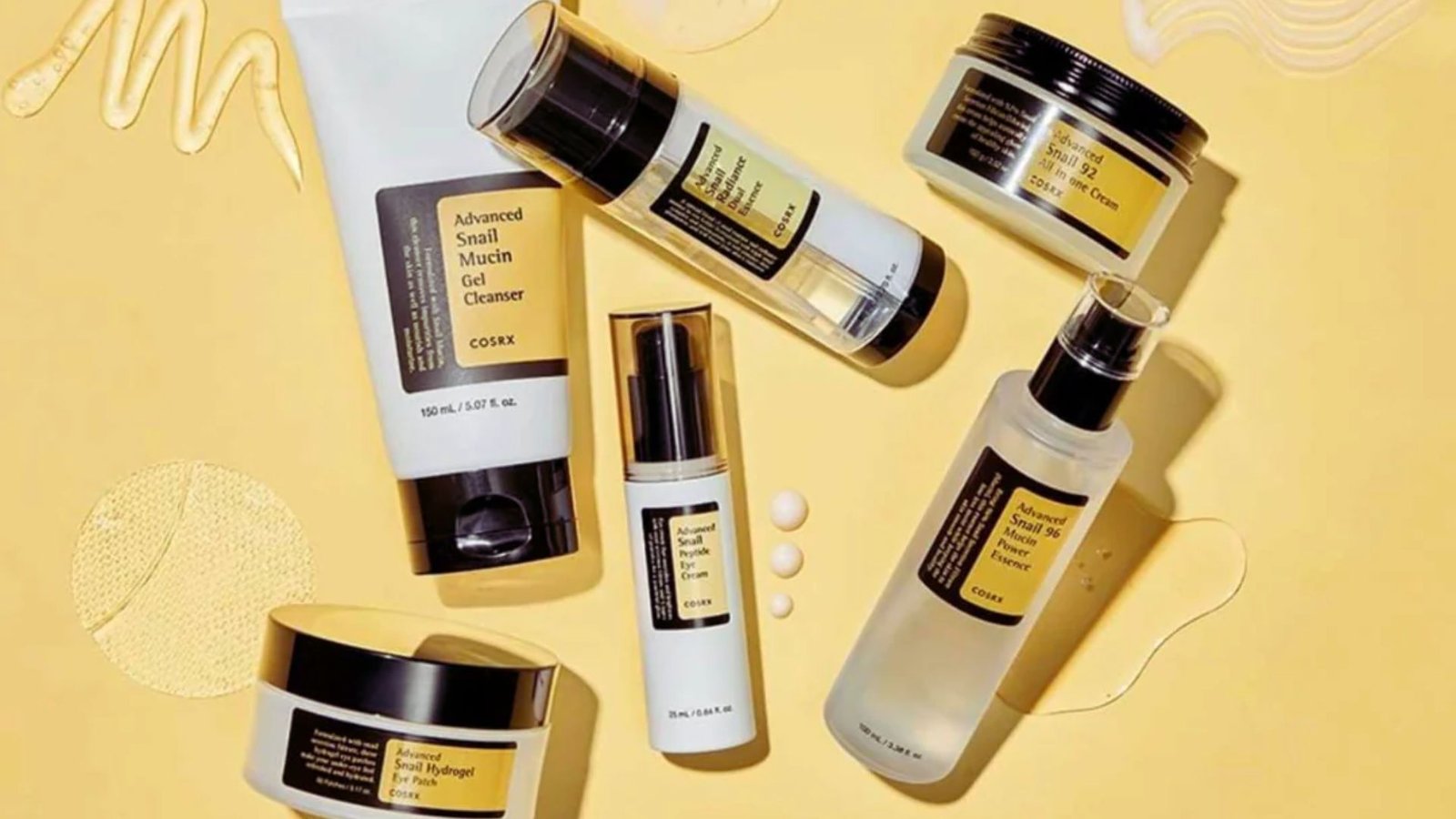 A collection of various COSRX skincare products, including cleansers and creams, on a light yellow background, evoking a fresh and clean feel.