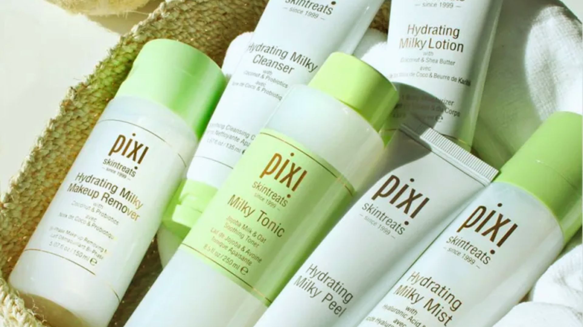 A basket filled with various pixi skin care products, showcasing their colorful packaging and diverse offerings.
