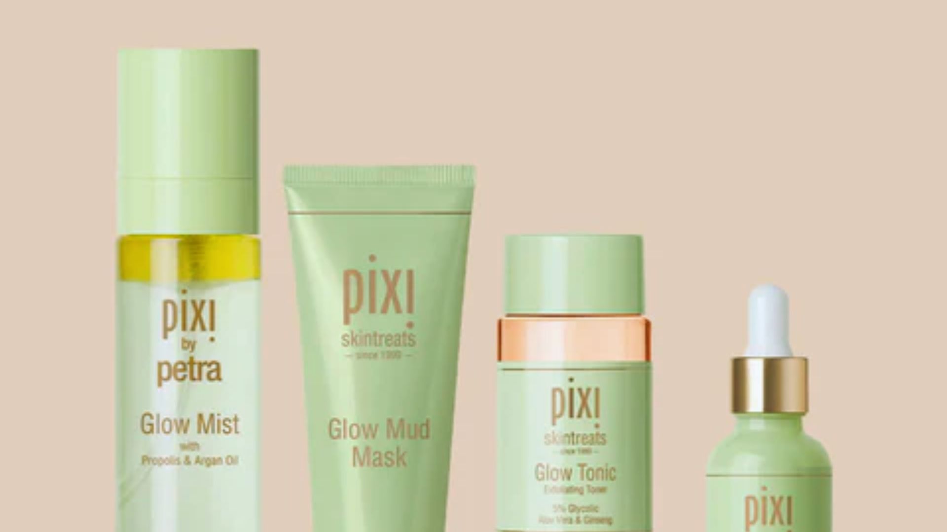 A collection of Pixi skincare products displayed on a white background, showcasing various bottles and jars.