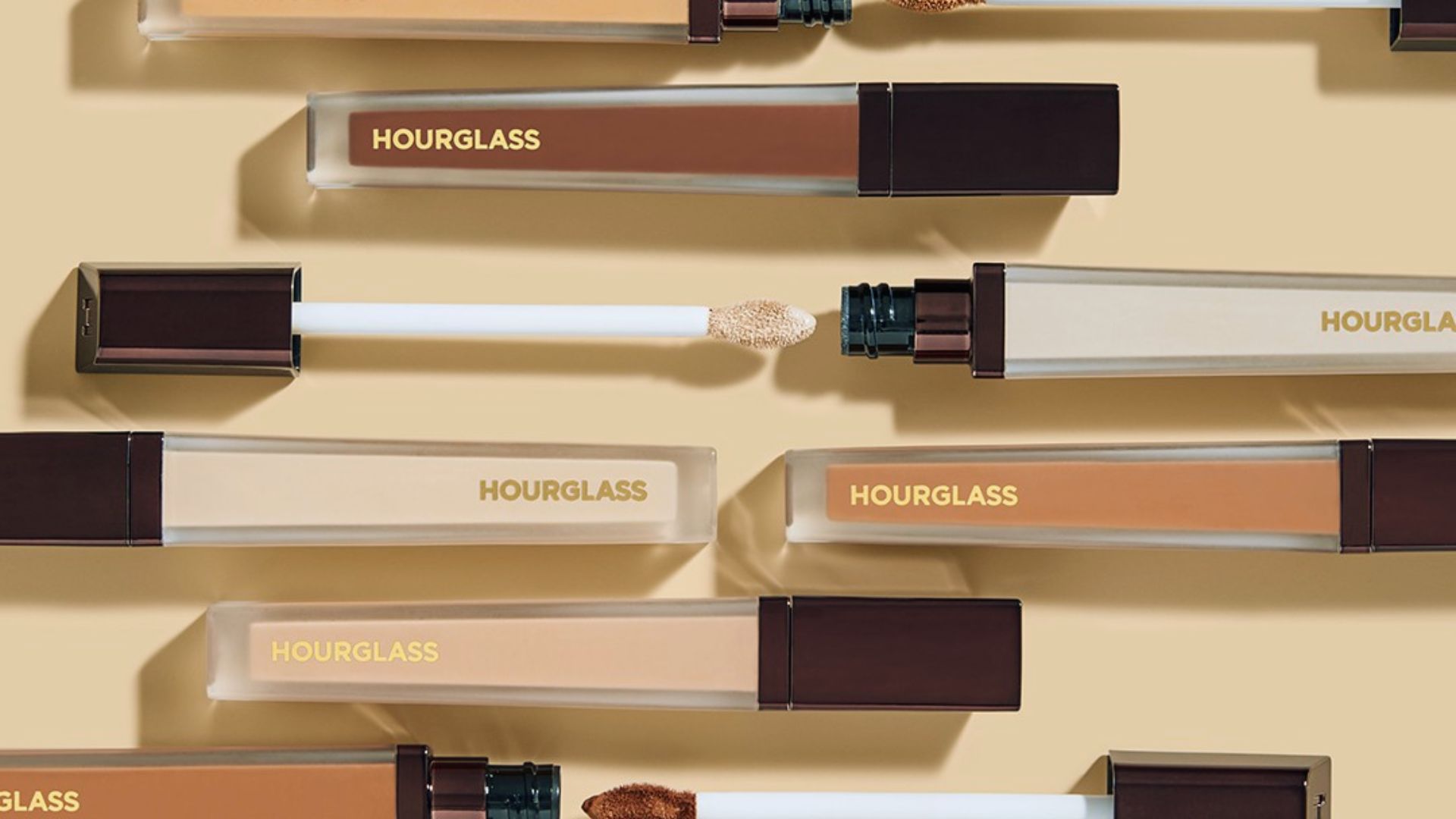A selection of top concealers designed to effectively cover under-eye circles, showcasing various brands and shades.